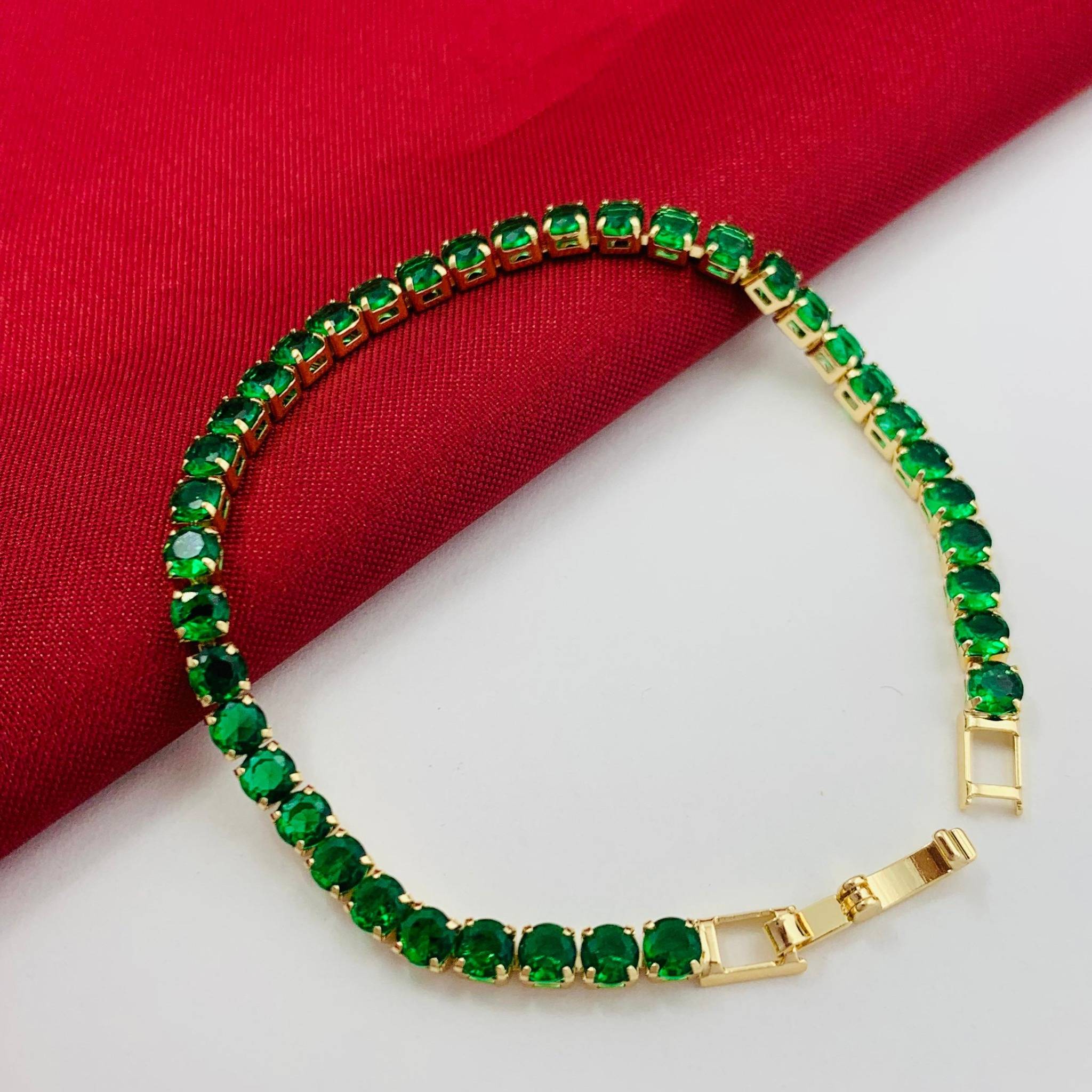 PULSERA EN RODIO CON GEMAS VERDES